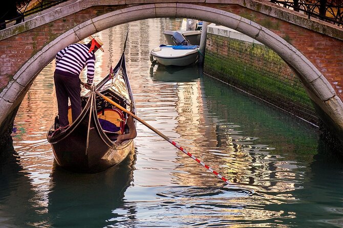 Gondola Ride and St Mark's Basilica - A shared gondola through smaller canals