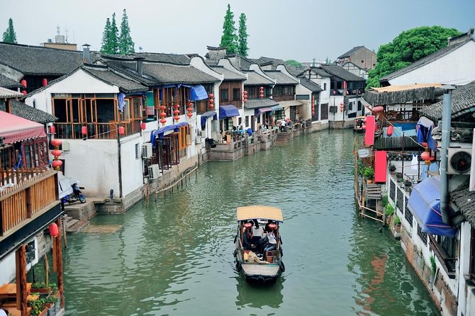 Private Zhujiajiao Ancient Town and Harmony Garden Day Tour with Gondola Ride - Zhujiajiao from the water, not just the main street