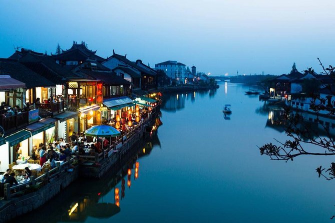 Private Zhujiajiao Ancient Town and Harmony Garden Day Tour with Gondola Ride - A slow boat through the canals