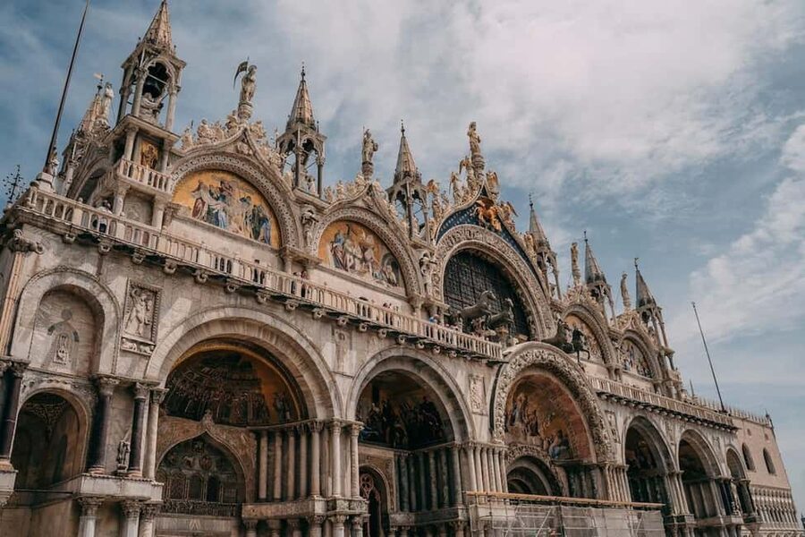 St. Mark's Basilica Tour with Priority Entrance + Gondola - Meeting beneath Venice’s blue clock tower