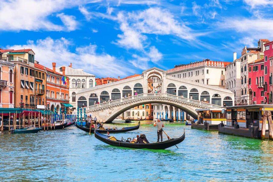 Venice: 30 minutes Enchanting Gondola Ride - Settling into a shared Venetian gondola