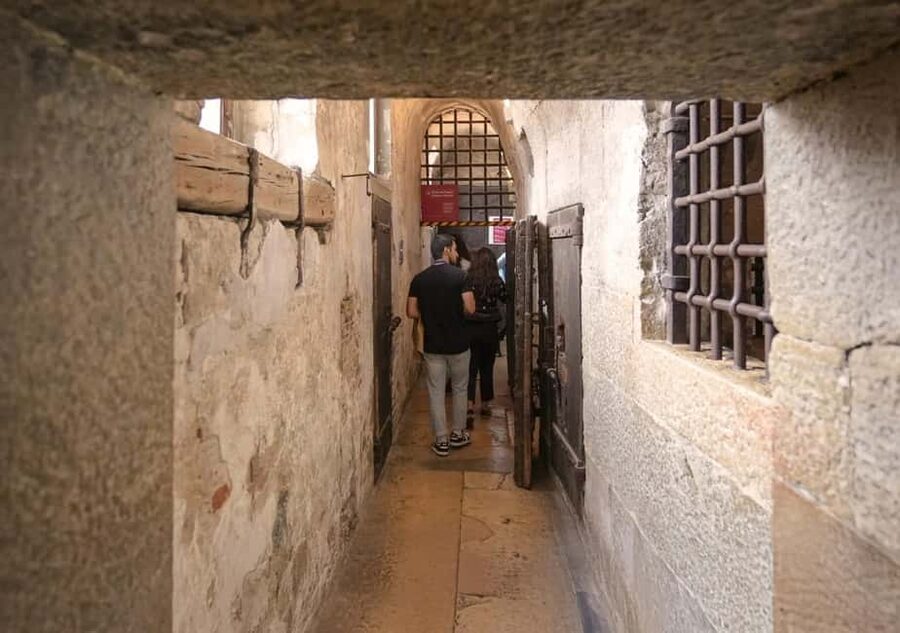 Venice: Doge's Palace and St Mark's Tour with Gondola Ride - Crossing toward the Bridge of Sighs