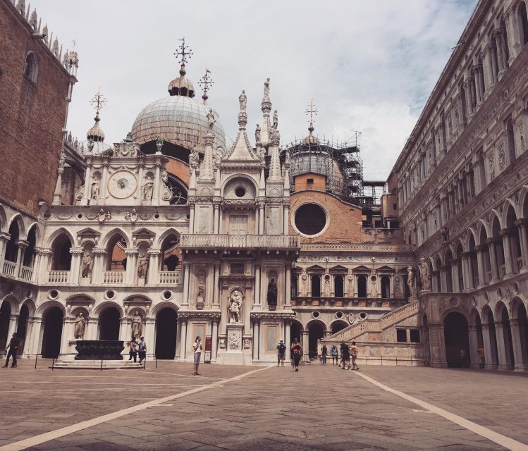 Venice: Gondola Ride and Skip the Line Doge's Palace Tour - Crossing the Bridge of Sighs