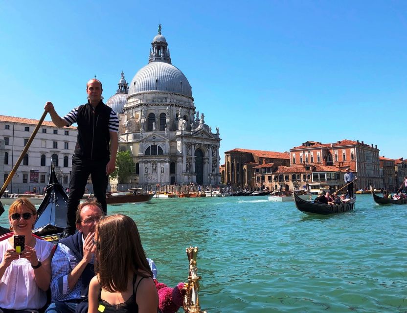 Venice: Shared Gondola Ride - Settling into a shared Venetian gondola