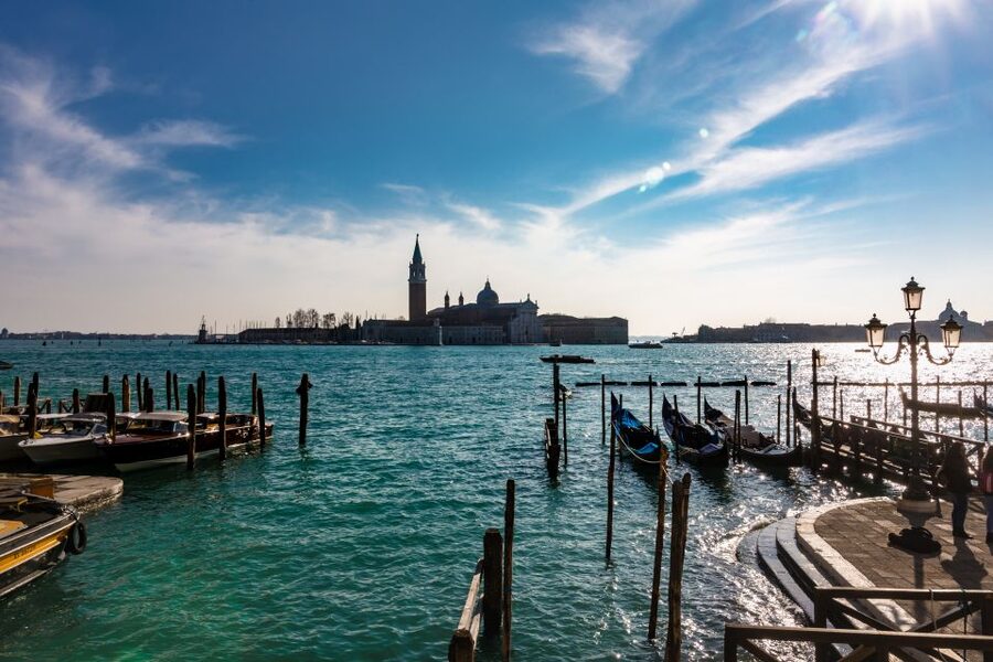 Venice: St Mark's Square & Rialto Walking Tour & Gondola - The gondola ride: romantic, shared, and weather dependent