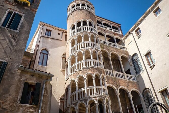 Venice Walking Tour with Gondola Ride Experience - Campi, campielli, and the stories of narrow calles